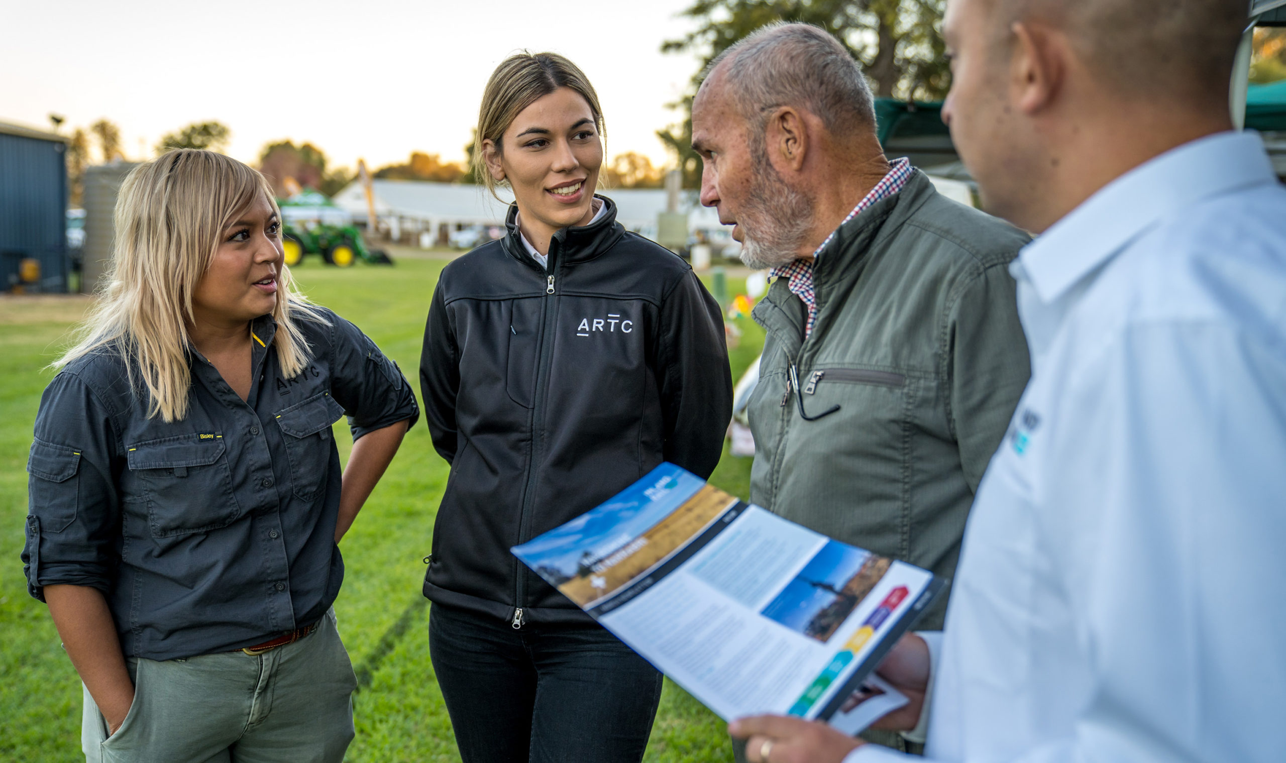 The Stakeholder Engagement team talking to a local man at the 2019 Coonamble Show, New South Wales