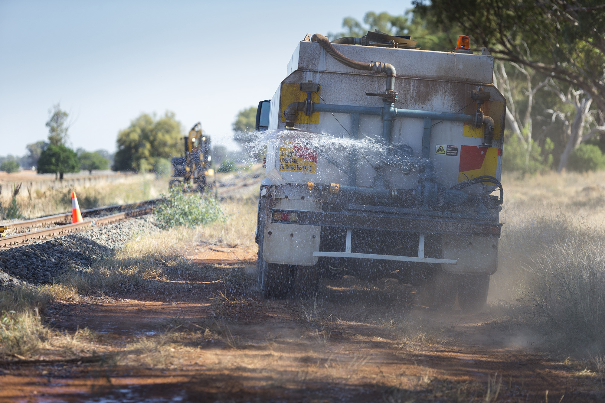 Water truck in action during construction