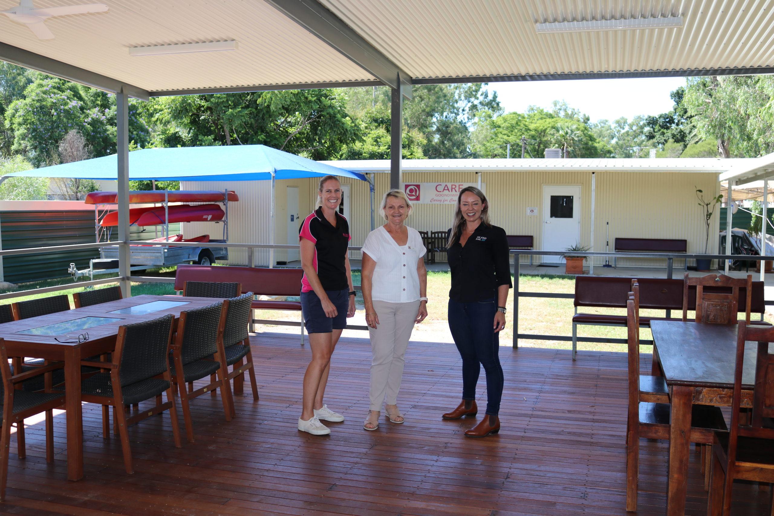 Care Goondiwindi and Inland Rail representatives standing on the deck of their new Care Community Space