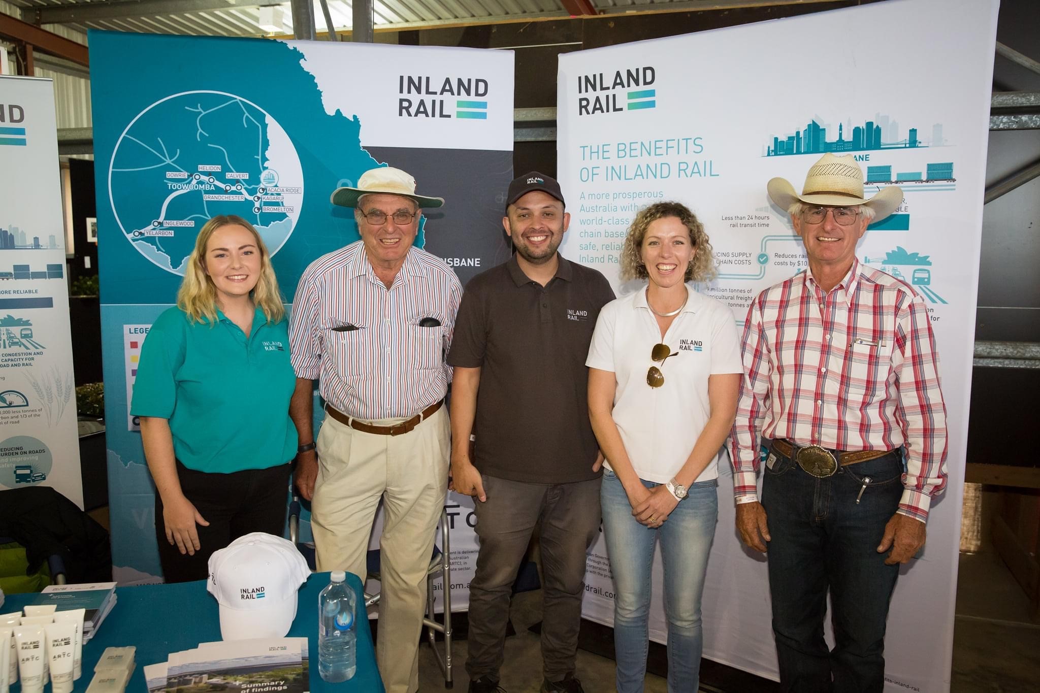 Inland Rail engagement staff standing with local landowners at Goondiwindi Show information stand