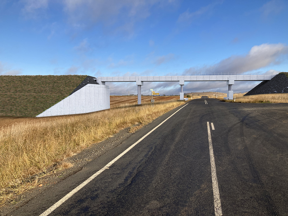The reference design proposes constructing a rail bridge over Old Cootamundra Road, Dudauman
