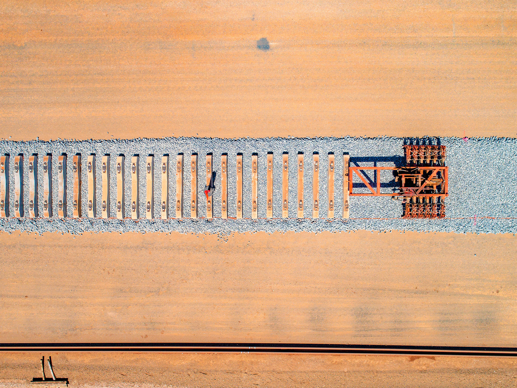 Aerial view of sleepers being laid on a section of the Inland Rail alignment