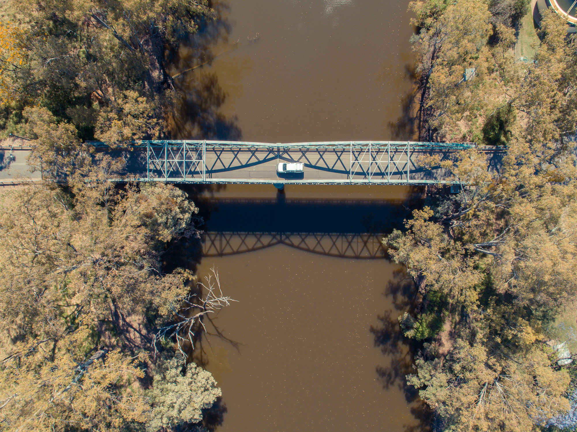 Car driving across the border bridge between NSW and Queensland at Goondiwindi