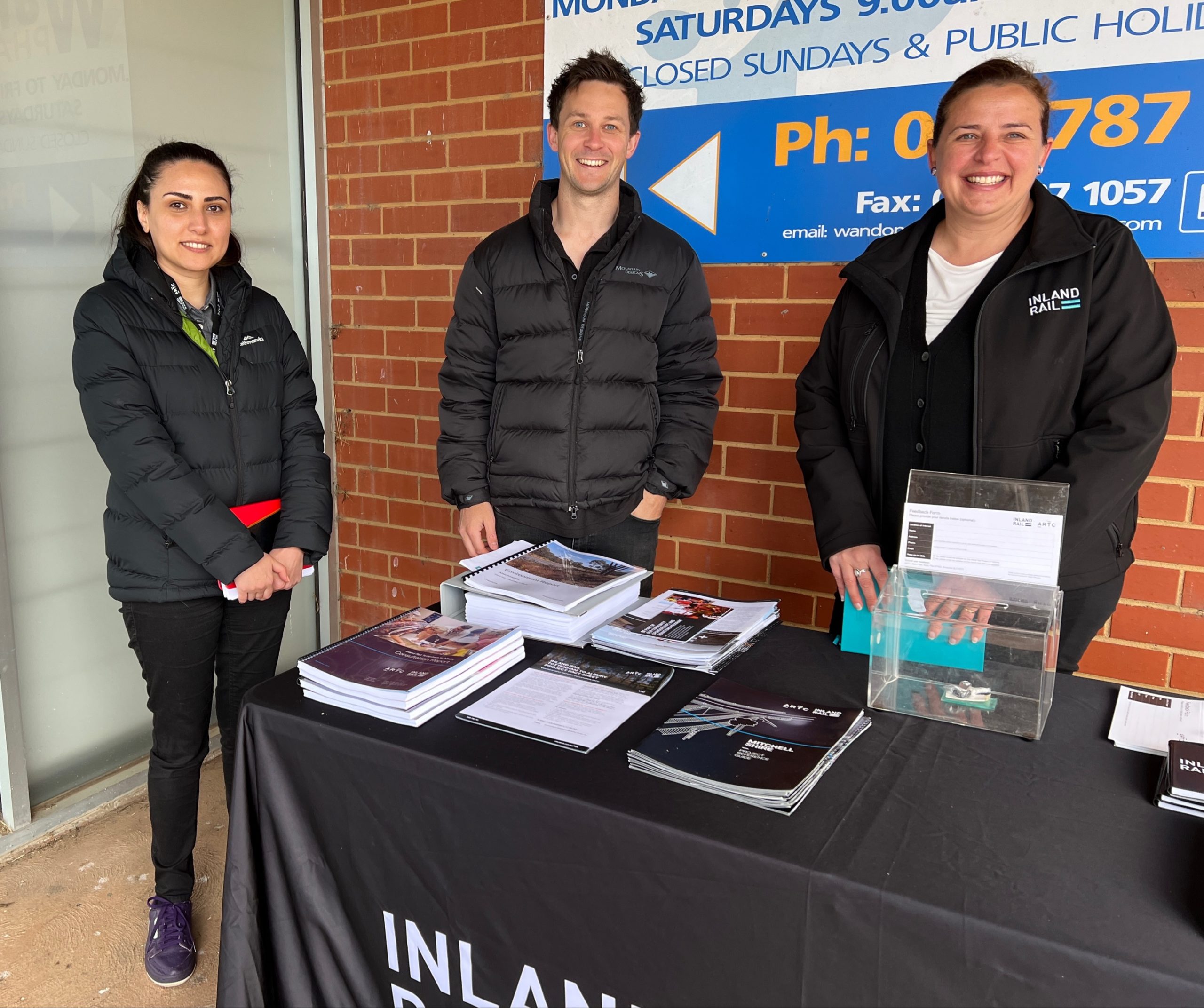 ARTC Inland Rail staff hosting a Tottenham to Albury Enviironment Report consultation stand in Wandong