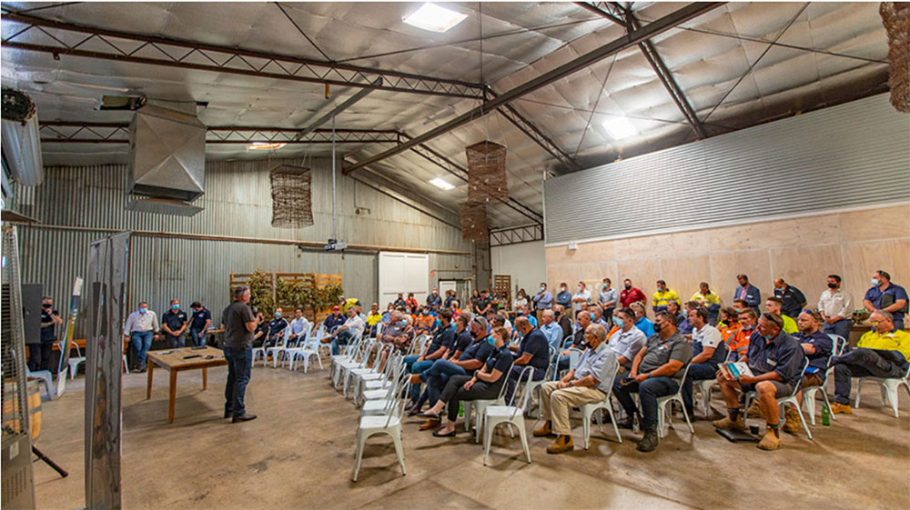 Guests listening to a speaker present at the Meet the Contractor event in February 2022