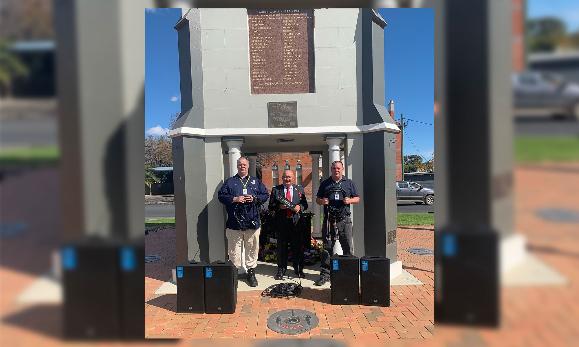 Junee RSL Sub-Branch’s Nicholas Pyers, grants officer, Greg Zakharoff, President, and David Johnson, audio visual technician, at the Junee Cenotaph with the new audio equipment