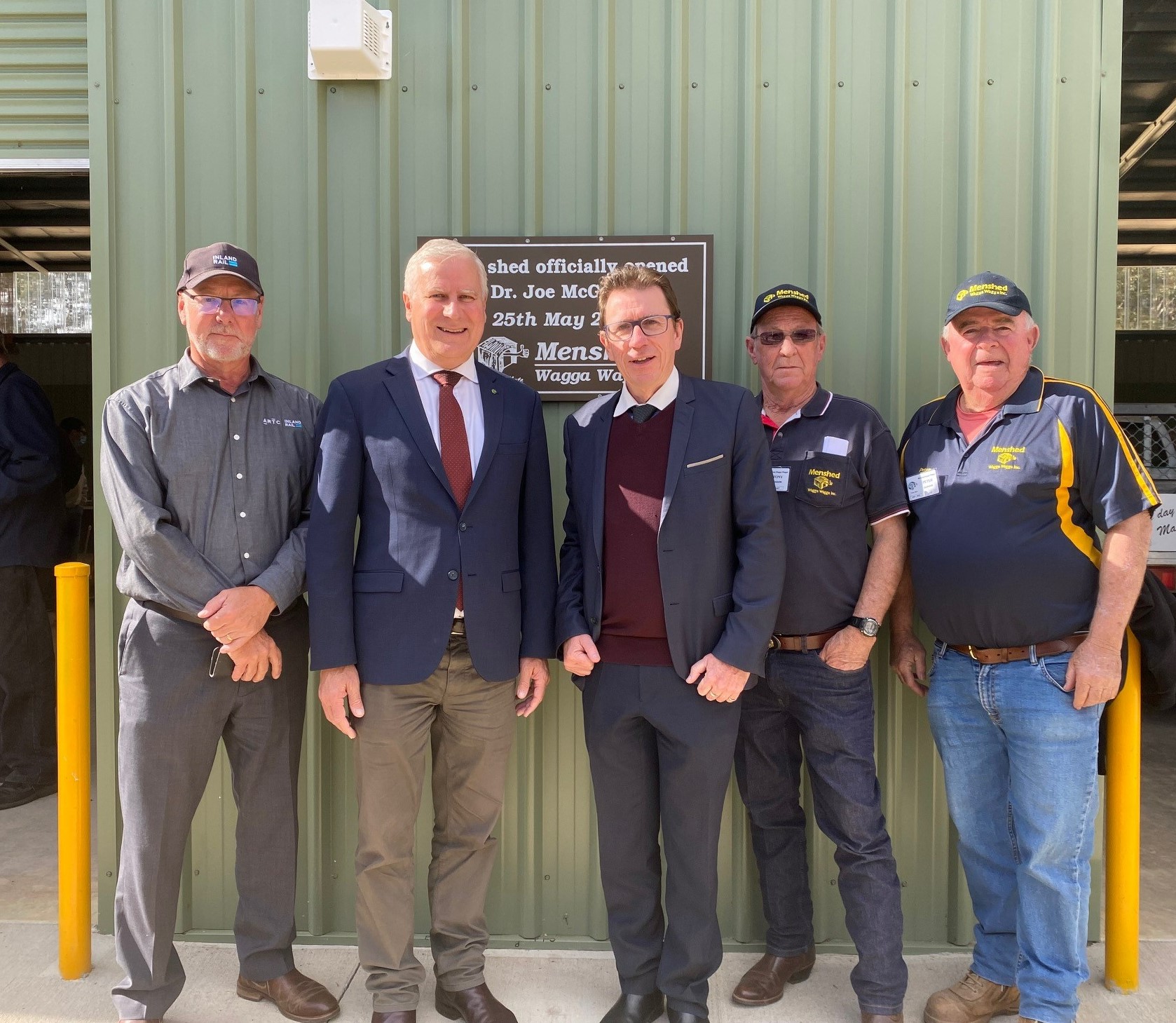 Men gather for photo in front of newly built Menshed in Wagga Wagga