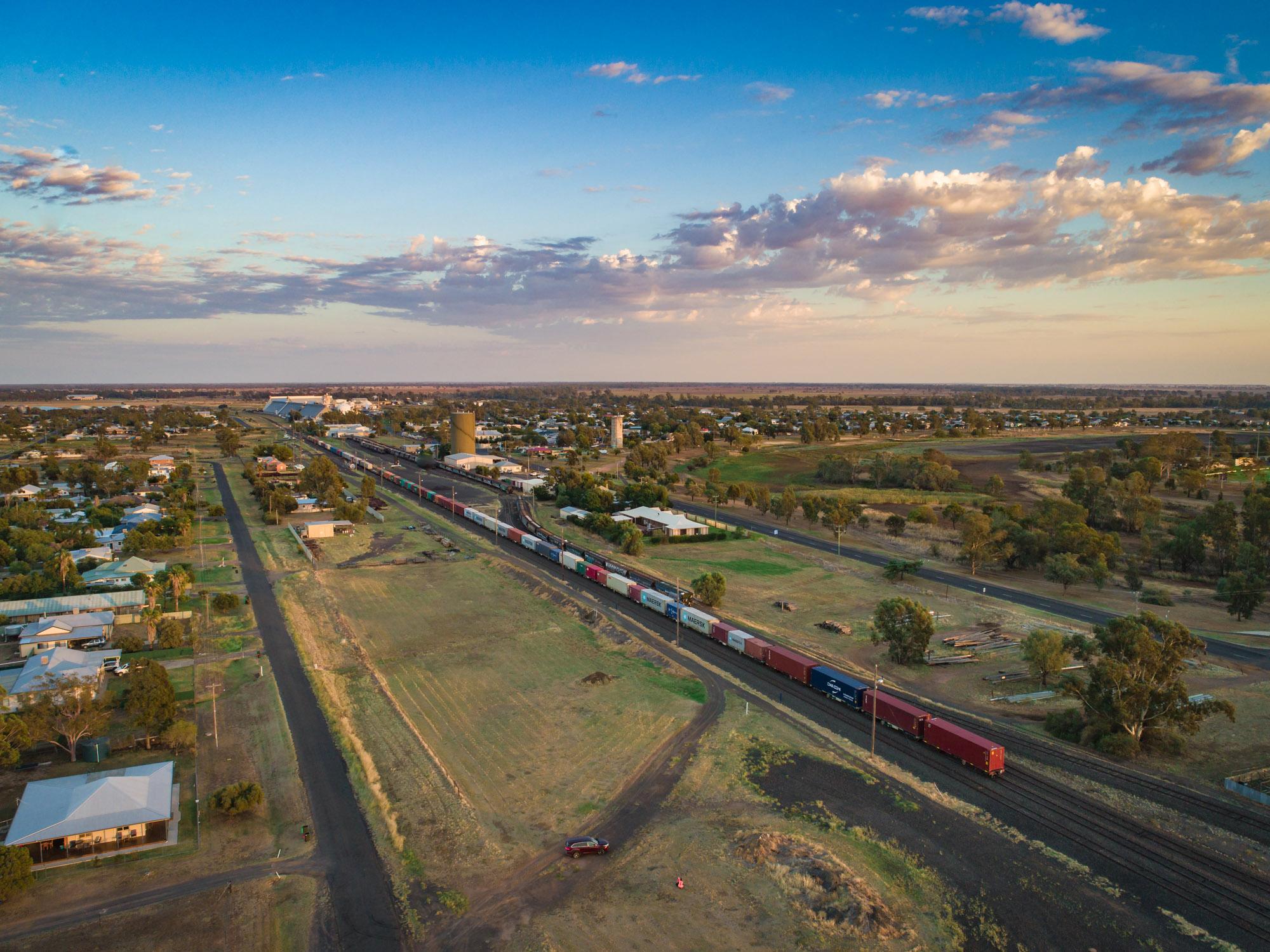 Aerial view of rail track and train near Narromine NSW