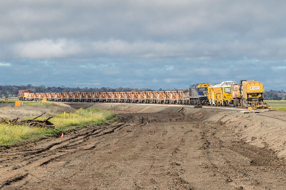 Ballast train, tamper and flash butt welder ready for use north of Narrabri