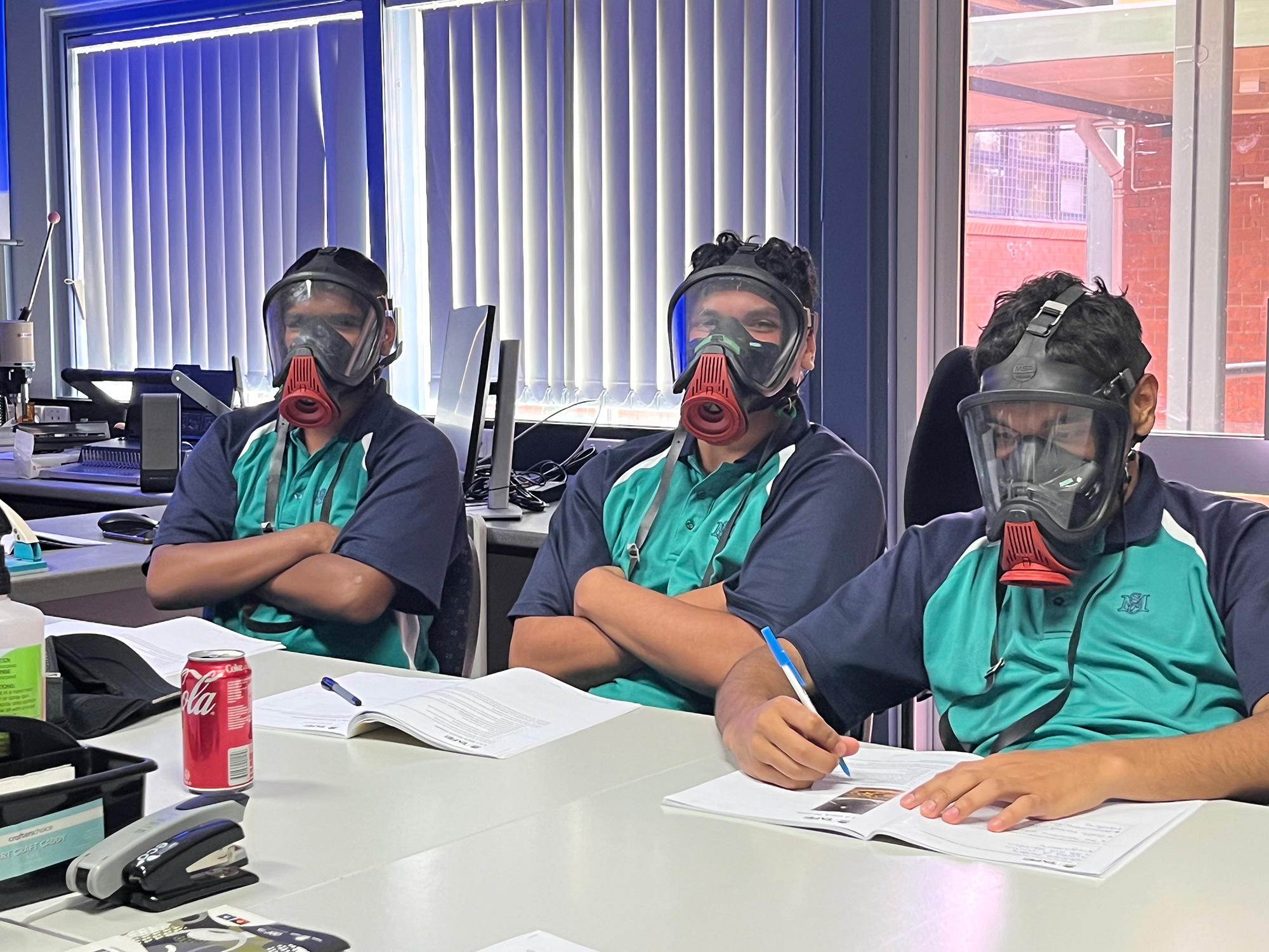 Image of three Moree Clontarf Academy students wearing safety PPE