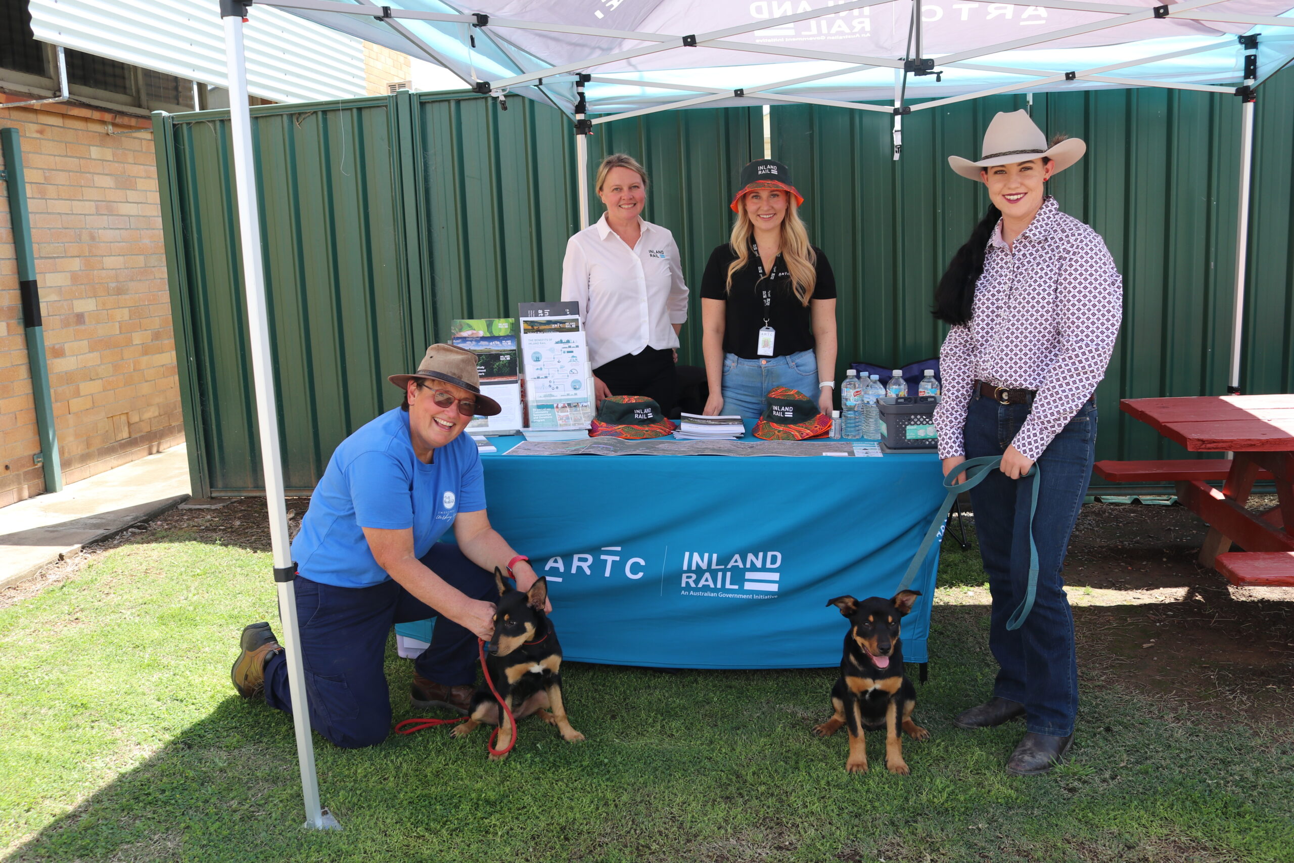 Image of Inland Rail staff and community members at an information stall in Pittsworth, Queensland.