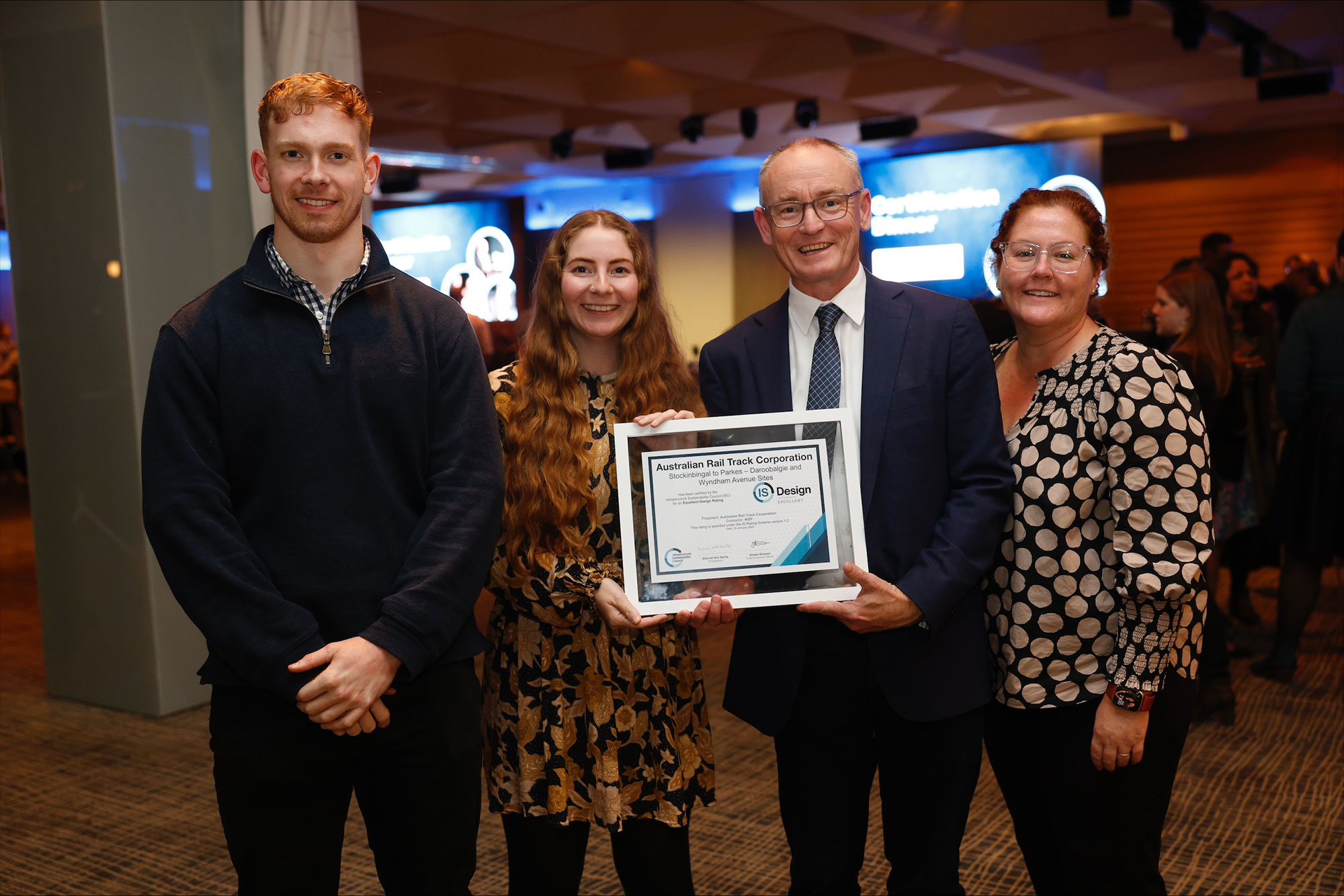 Inland Rail sustainability team members (left to right) Liam West, Meghan Cowling, Andrew Aitken & Sarah Connelly pictured with the IS Council award at the Annual Conference Certification Dinner in Melbourne