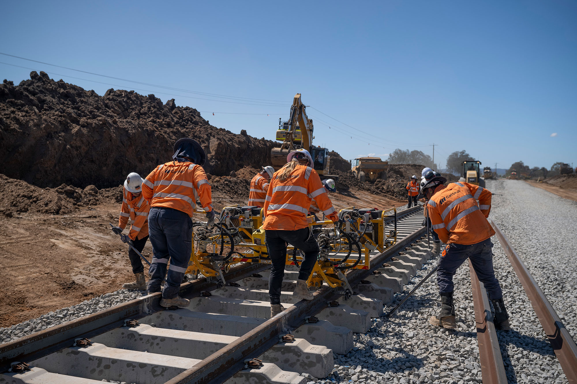 Workers re-laying the new track at Murray Valley Highway site, Barnawartha North during the September possession