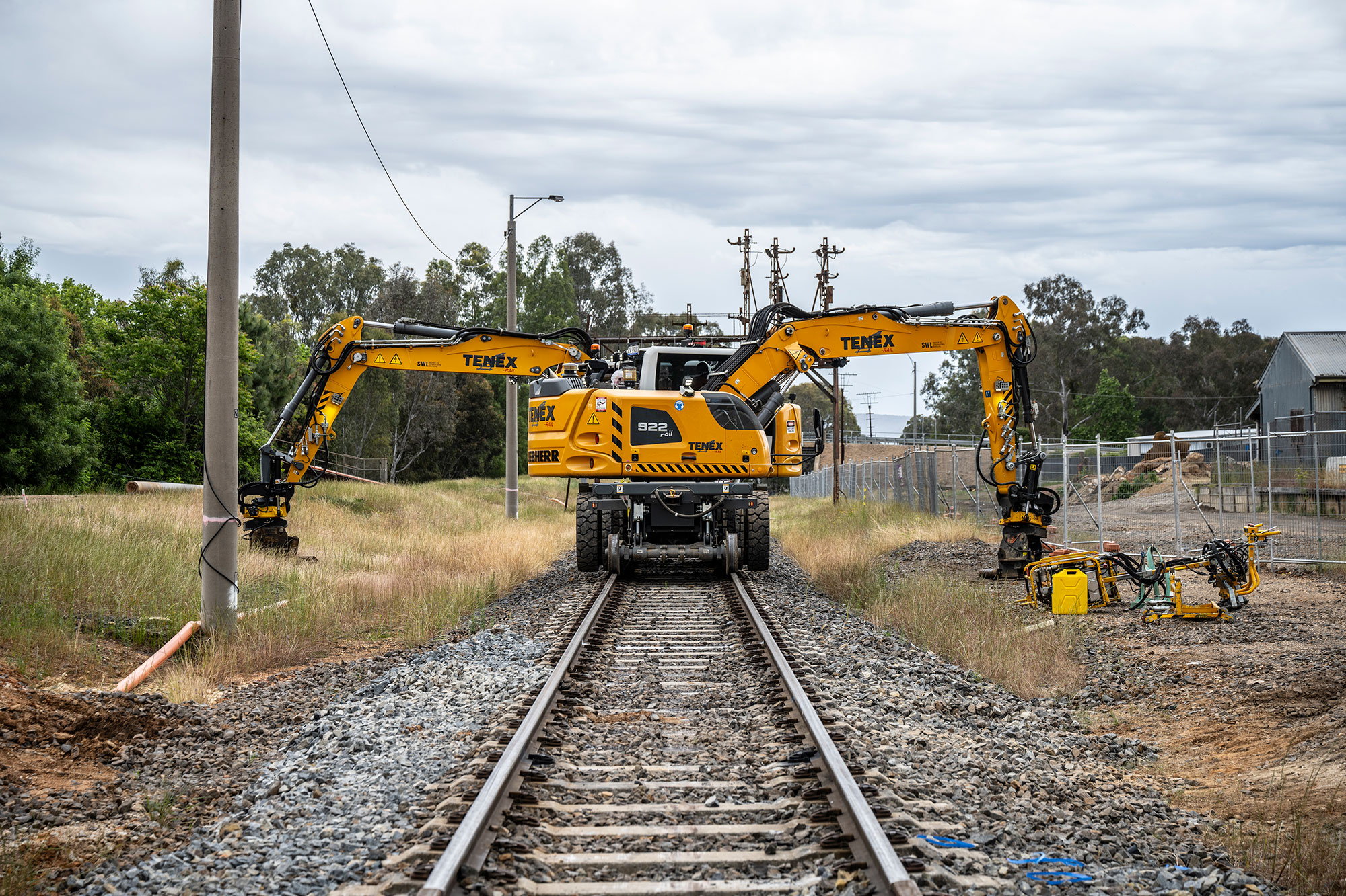 A high rail vehicle does track work at Wangaratta